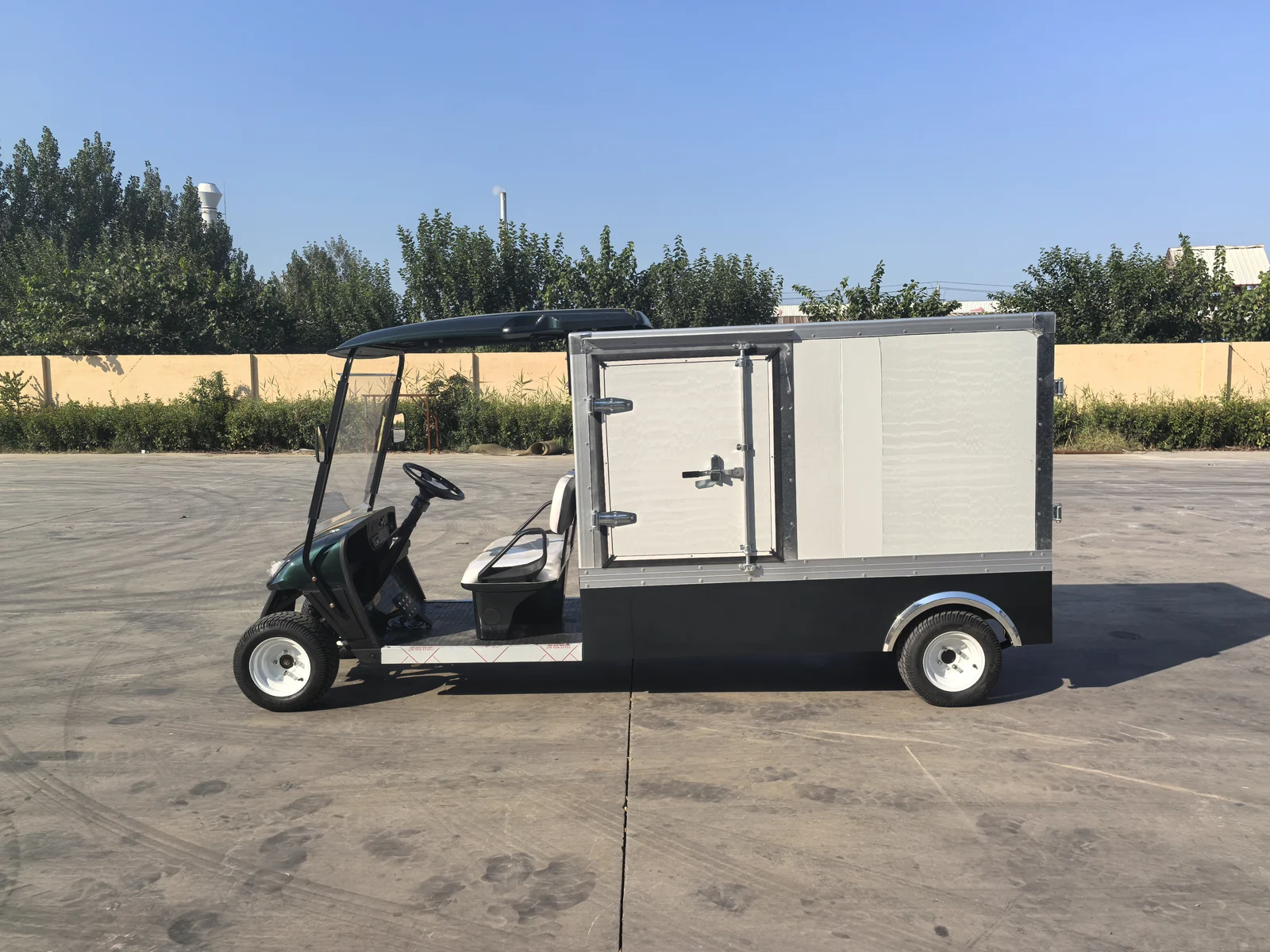 Huajia Enclosed Box Cargo Electric Utility Buggy - Cargo Utility Vehicle by Huajia Machinery. The Huajia Enclosed Box Cargo Utility Buggy is engineered for institutional, hospital, hotel, and in angle 2