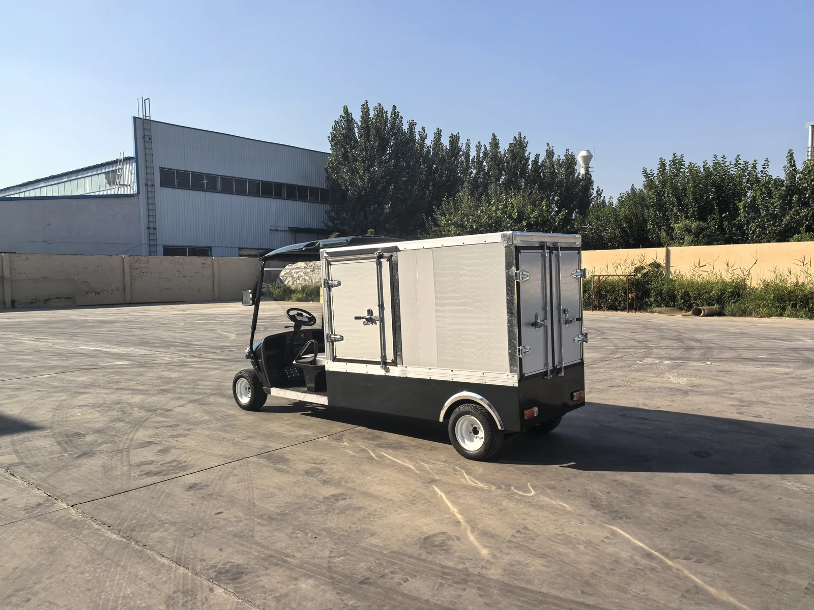 Huajia Enclosed Box Cargo Electric Utility Buggy - Cargo Utility Vehicle by Huajia Machinery. The Huajia Enclosed Box Cargo Utility Buggy is engineered for institutional, hospital, hotel, and in angle 3