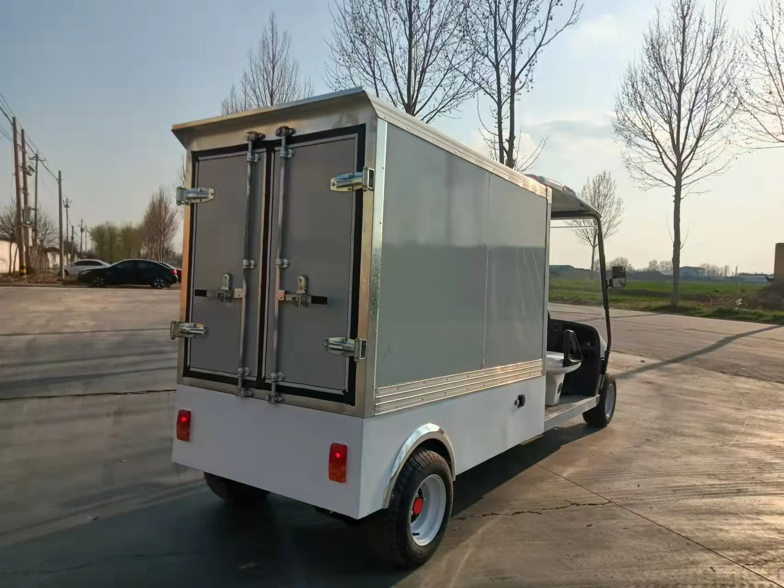 Huajia Enclosed Box Cargo Electric Utility Buggy - Cargo Utility Vehicle by Huajia Machinery. The Huajia Enclosed Box Cargo Utility Buggy is engineered for institutional, hospital, hotel, and in angle 6