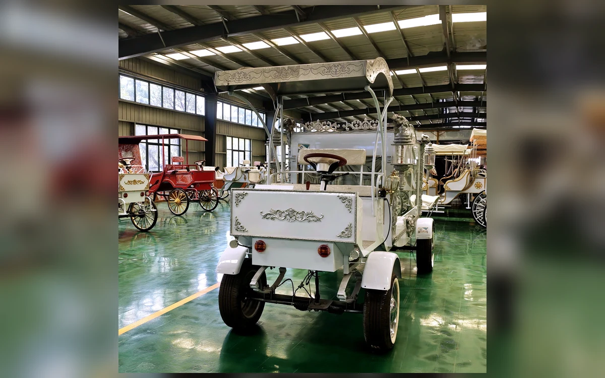 Huajia Royal Funeral Coach - Funeral Coach by Huajia Machinery. The Huajia Royal Funeral Coach is a white ceremonial hearse carriage designed for memorial services, angle 4