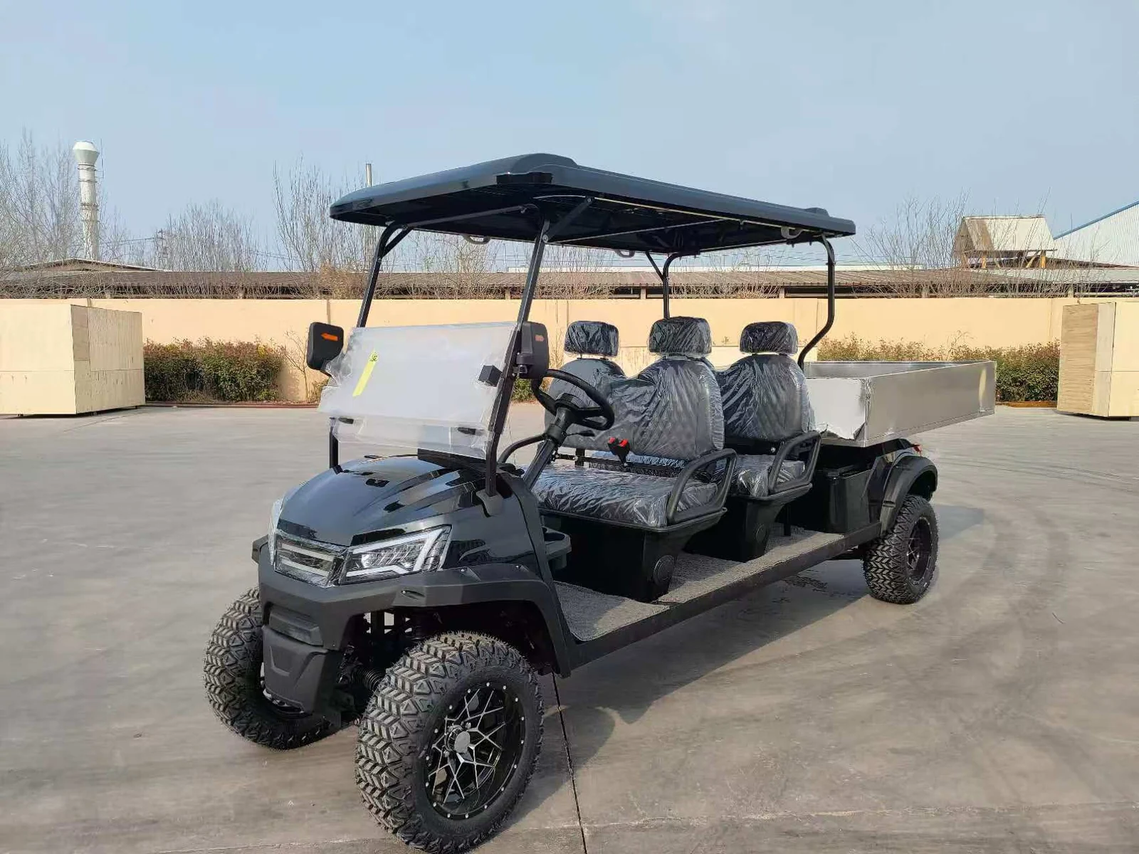 Huajia White Cargo Golf Cart - Cargo Golf Cart by Huajia Machinery. The Huajia White Cargo Golf Cart combines an open one-row driving compartment with a fixed rear carg angle 4